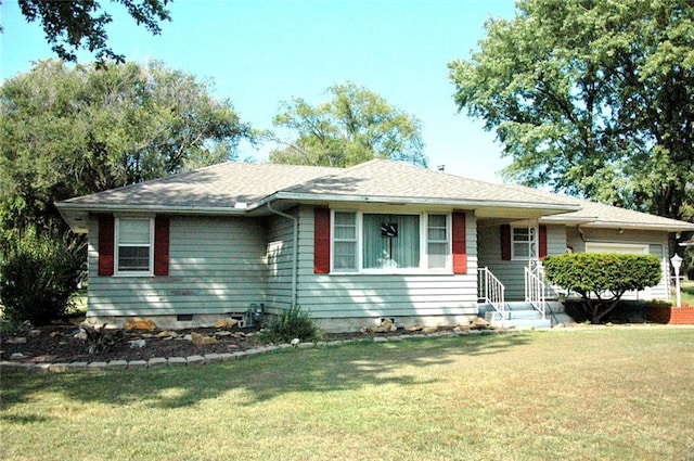 single story home with a front lawn