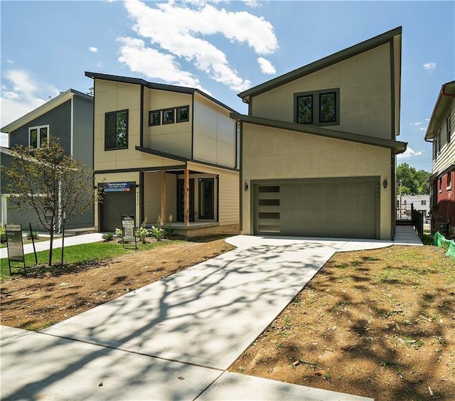 modern home featuring a garage