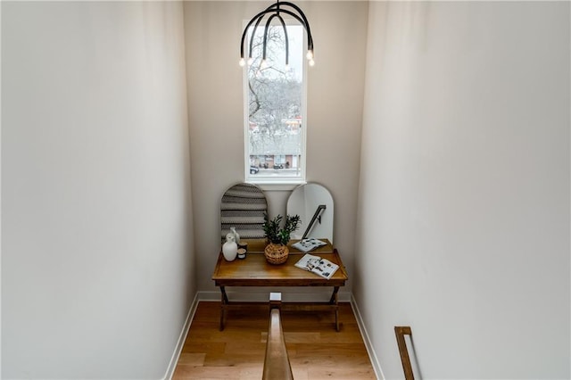 doorway to outside with light wood-type flooring