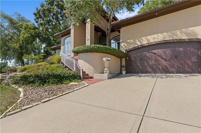 view of front of property featuring a garage