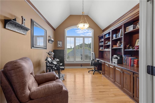 office featuring ornamental molding, vaulted ceiling, and light hardwood / wood-style flooring