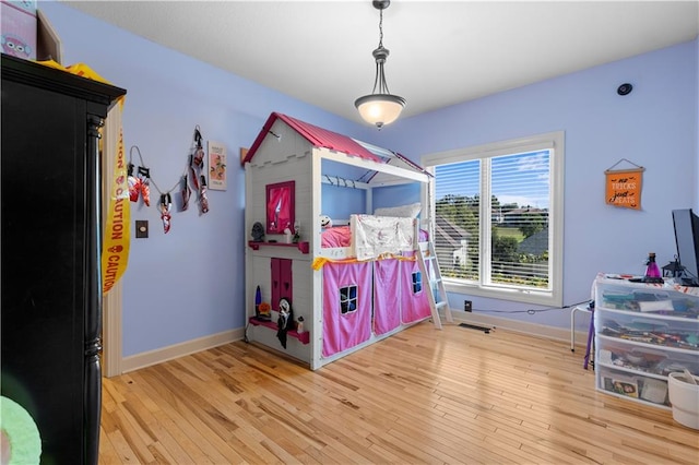 bedroom featuring light hardwood / wood-style floors