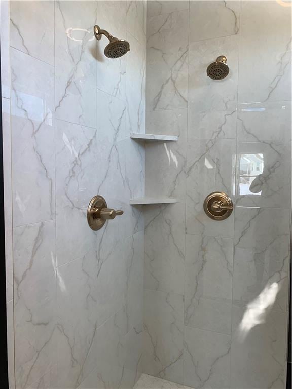 bathroom with a stall shower