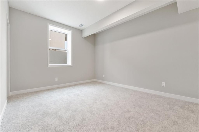 view of carpeted spare room