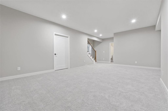 basement with light carpet