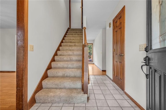 stairway featuring hardwood / wood-style flooring