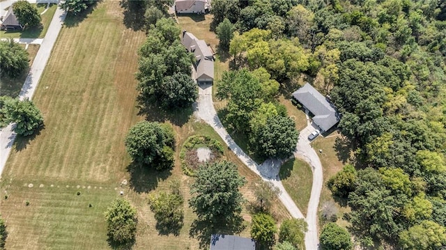 birds eye view of property with a rural view