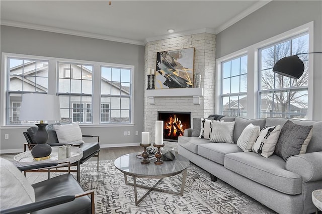 living room featuring a brick fireplace, crown molding, and wood-type flooring