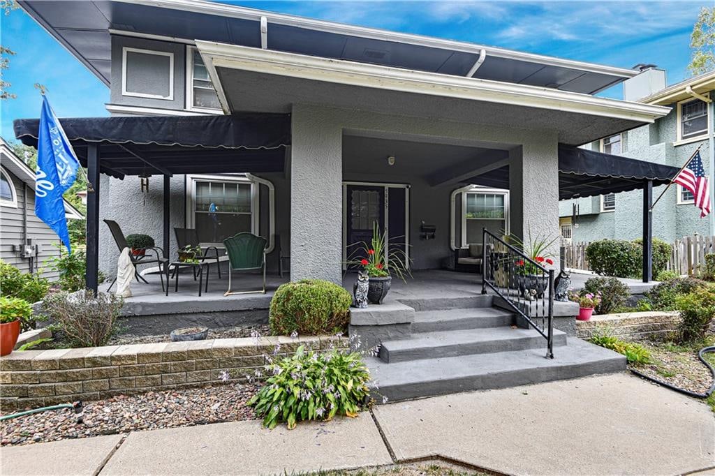 exterior space with a pergola and a porch