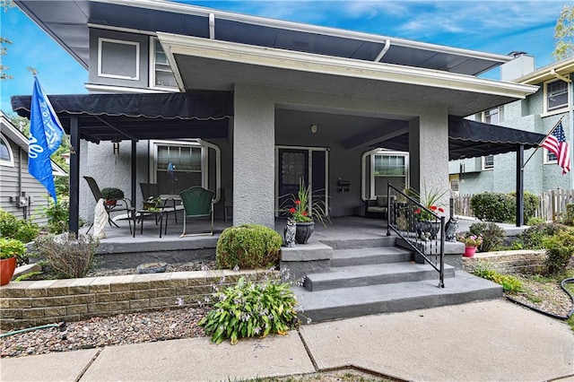 exterior space with a pergola and a porch