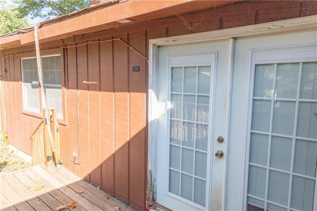 doorway to property with a deck