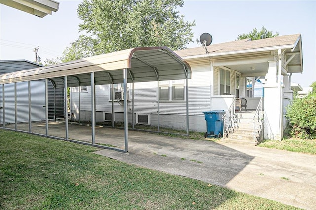 view of parking / parking lot featuring a lawn and a carport