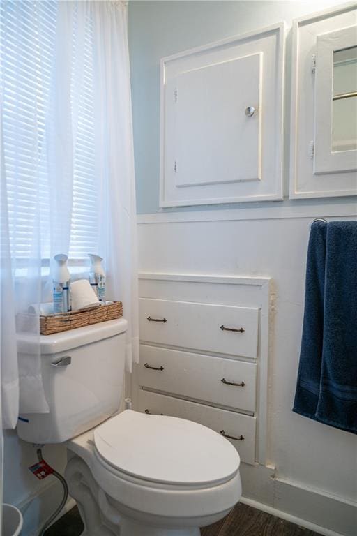 bathroom featuring toilet and hardwood / wood-style floors