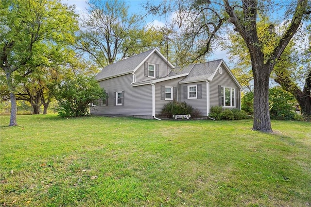 view of property exterior featuring a yard