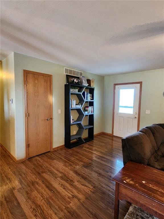 interior space featuring dark wood-type flooring