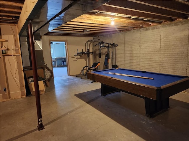 recreation room with concrete floors and pool table