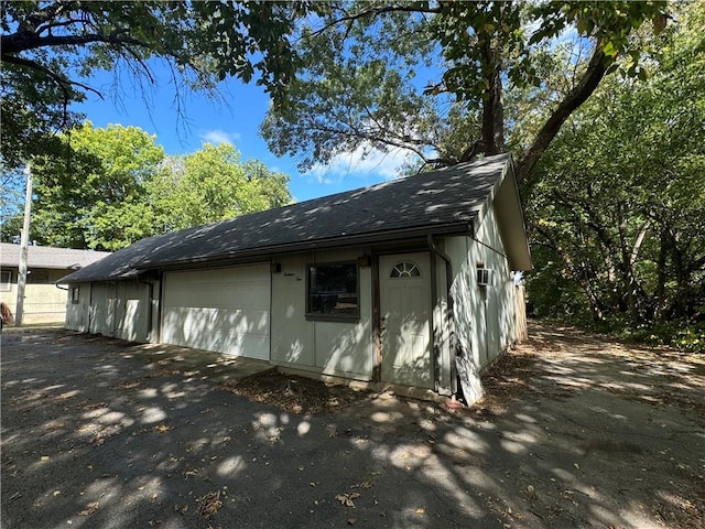 view of outdoor structure with a garage