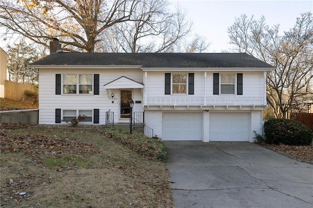 split foyer home featuring a garage