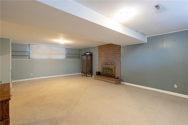 basement with a fireplace