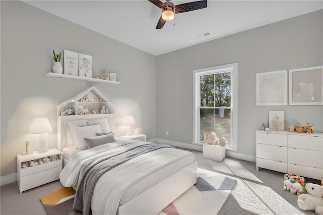 bedroom featuring ceiling fan and light colored carpet