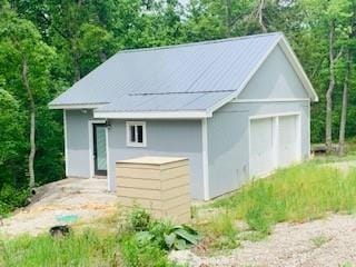 view of outbuilding with a garage