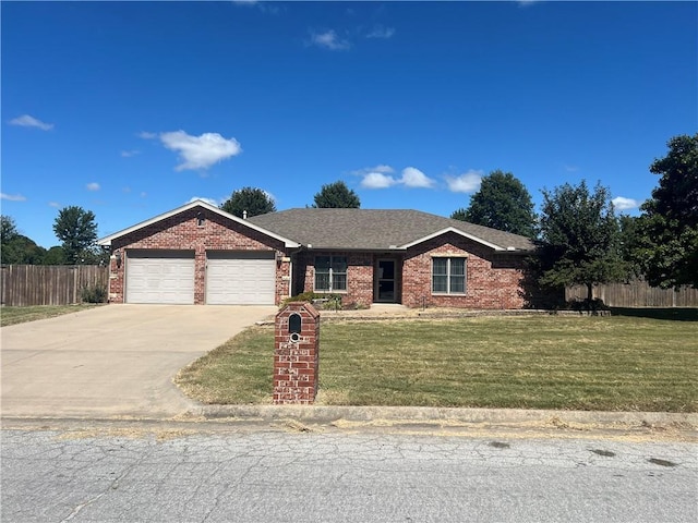 single story home featuring driveway, an attached garage, fence, and a front lawn