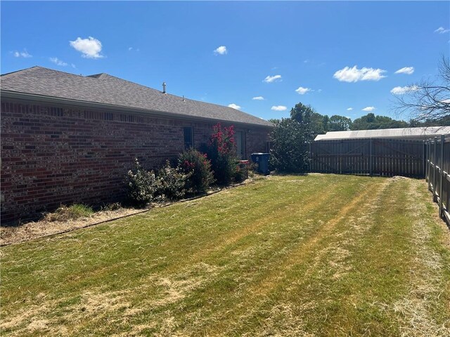 view of yard with fence