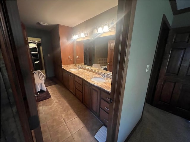 bathroom with vanity and tile patterned flooring