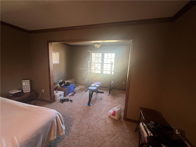 carpeted bedroom featuring ornamental molding