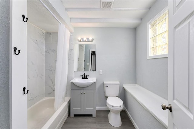 full bathroom with shower / bath combination with curtain, wood-type flooring, vanity, and toilet