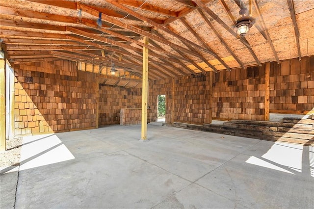 miscellaneous room featuring lofted ceiling