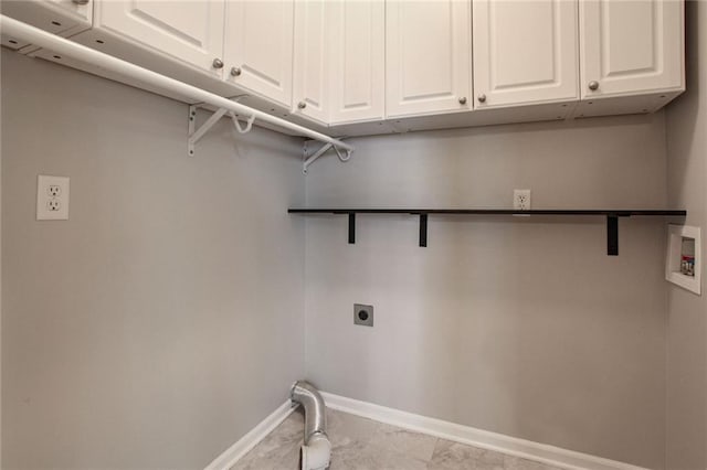 laundry room with cabinets, washer hookup, and electric dryer hookup