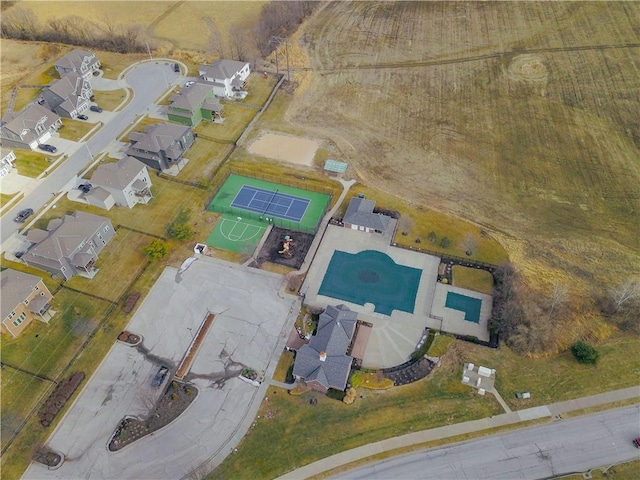 birds eye view of property with a residential view