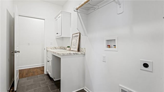 laundry area with hookup for a washing machine, a sink, baseboards, cabinet space, and electric dryer hookup