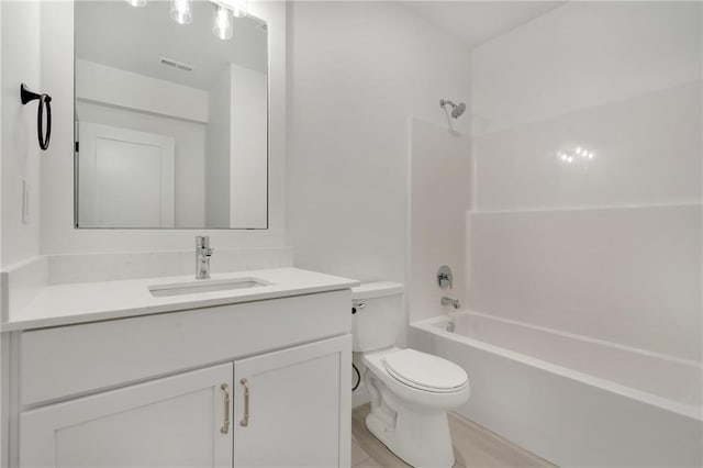 full bath with bathtub / shower combination, visible vents, vanity, and toilet