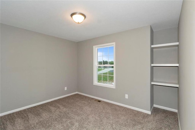 unfurnished bedroom featuring carpet