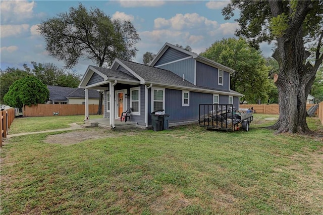 back of house featuring a yard