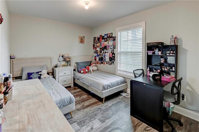 bedroom featuring hardwood / wood-style floors