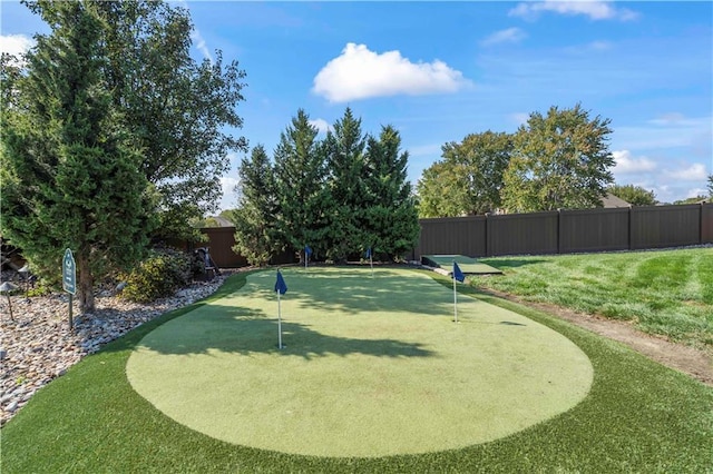 view of community featuring a fenced backyard