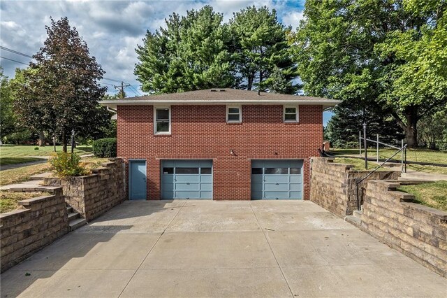 exterior space with a garage