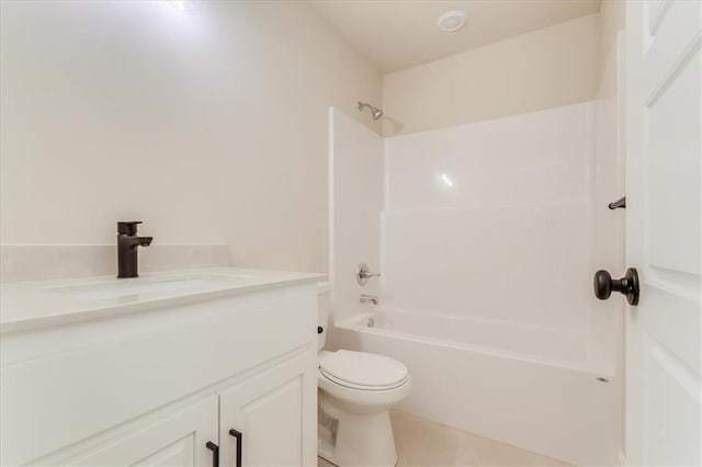 bathroom with bathtub / shower combination, vanity, toilet, and tile patterned floors