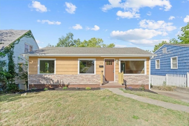 view of front of home with a front yard