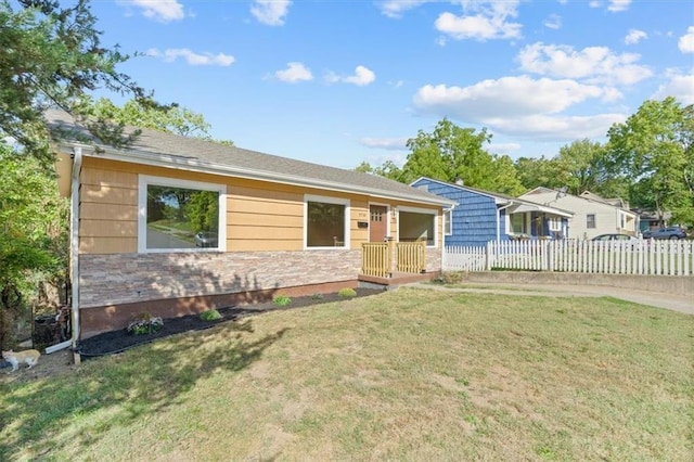 ranch-style house with a front yard