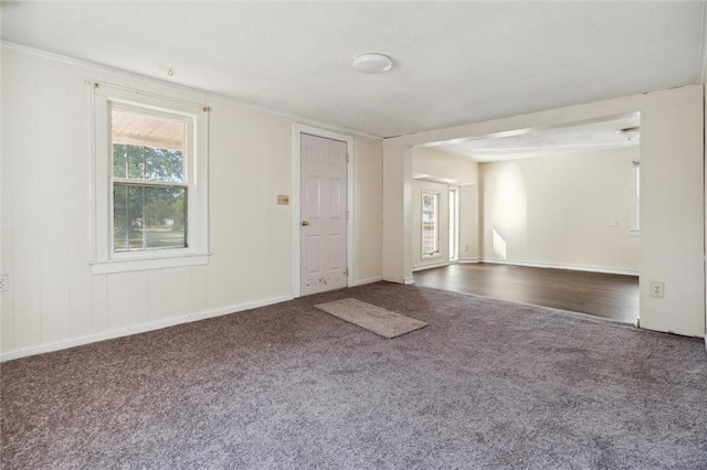 unfurnished room with hardwood / wood-style floors