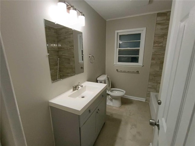 full bathroom with tiled shower / bath combo, crown molding, vanity, and toilet