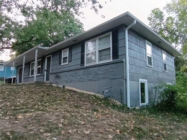6914 Rowland Ave, Kansas City, KS 66109 - view of side of home