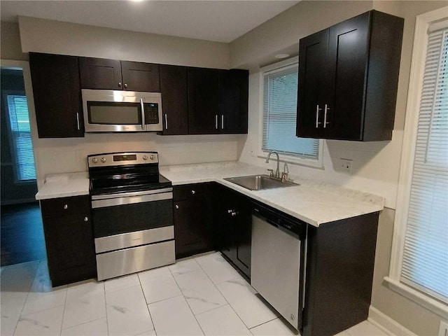 kitchen featuring appliances with stainless steel finishes and sink