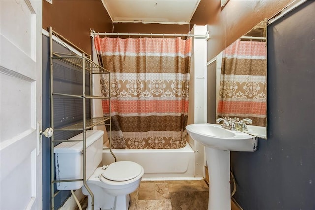 bathroom with shower / bath combo and toilet