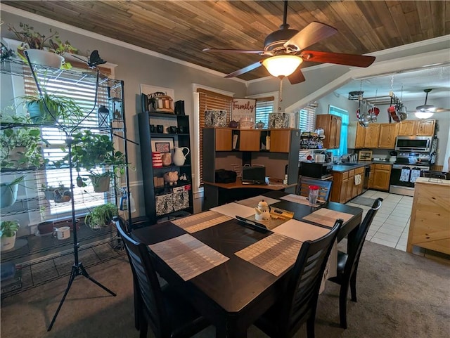 tiled dining room featuring wood ceiling, ornamental molding, sink, and ceiling fan