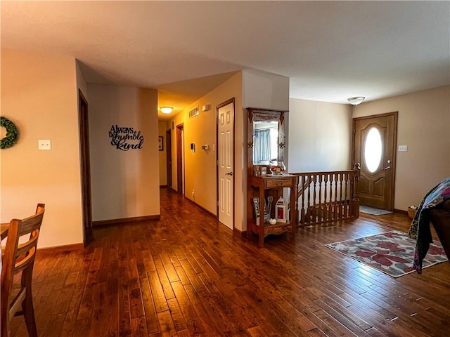 interior space with dark hardwood / wood-style flooring